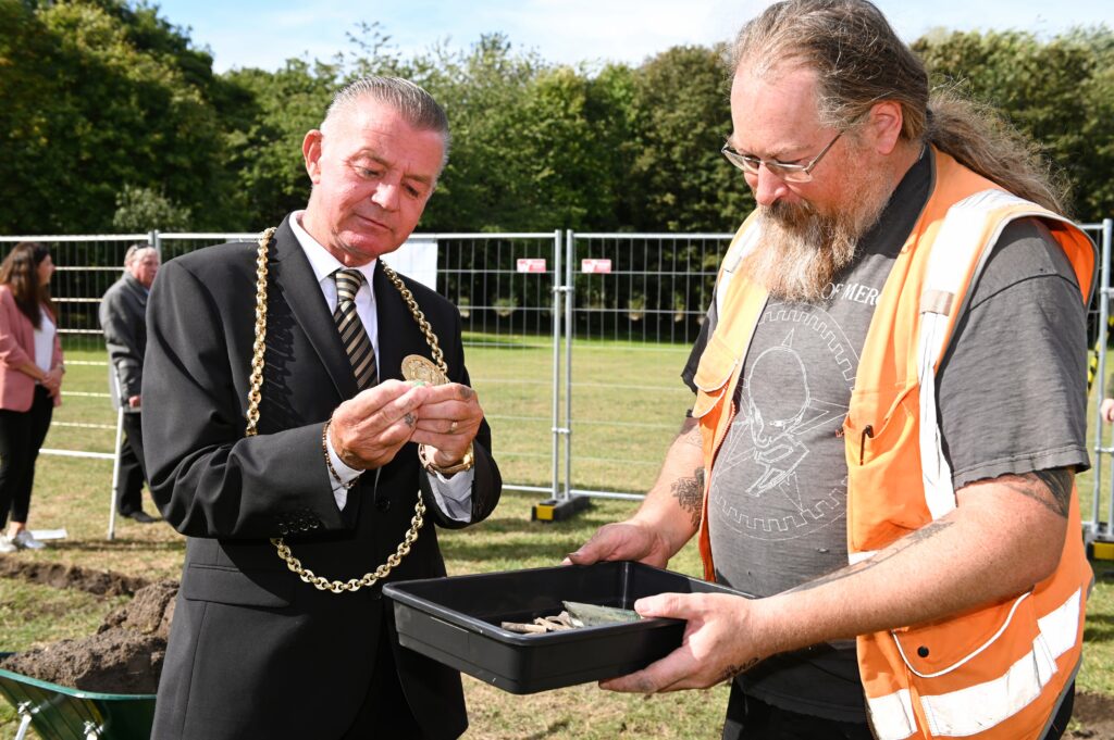 Groundwork South and North Tyneside - Mayor of South Tyneside Cllr Jay Potts breaks ground at Jarrow Archaeological Mission in Drewetts Park, with Marco Romeo-Pitone.