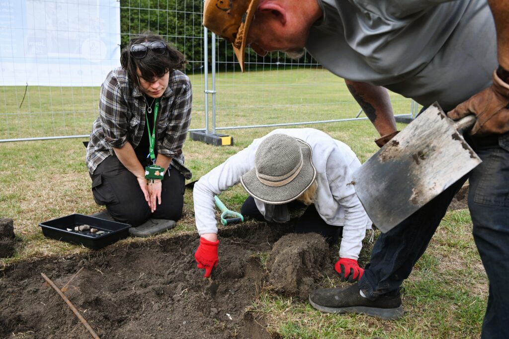 Groundwork South and North Tyneside - Mayor of South Tyneside Cllr Jay Potts breaks ground at Jarrow Archaeological Mission in Drewetts Park, with Marco Romeo-Pitone.